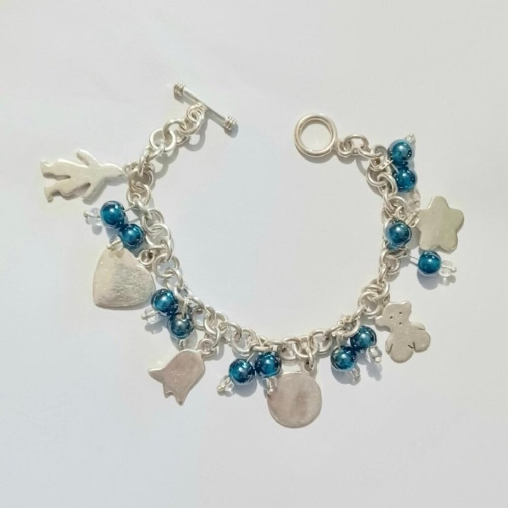 Sterling Silver 37 Gram Charm Bracelet All Sterling Blue And Clear Glass